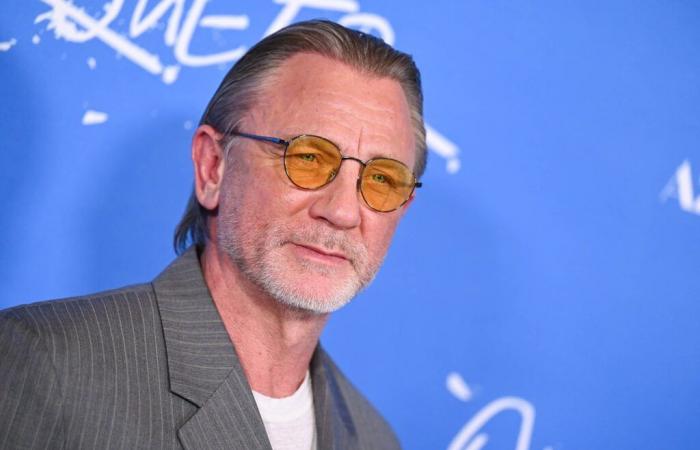 Slicked back hair and sunglasses for Daniel Craig at the “Queer” premiere