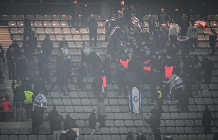 violent brawl between supporters at the Stade de France