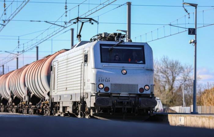 A train hits a vehicle stopped at a level crossing