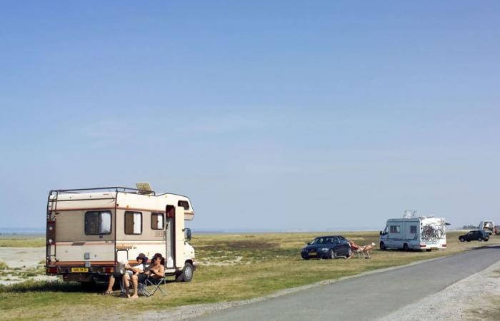 A woman hits her partner in a camper van