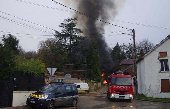 A building ravaged by flames in Lecey