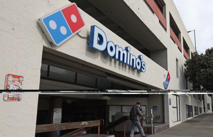 Warren Buffett takes a stake in Domino's Pizza, whose shares are climbing on Wall Street