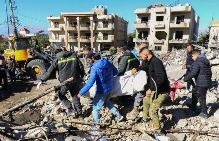 After a strike in Lebanon, a rescuer searches for her father in the rubble