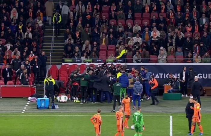 a member of the Hungarian staff convulses on the bench, the match is stopped