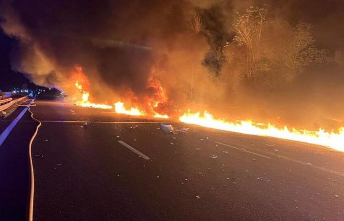 a truck hits a car on the hard shoulder and bursts into flames on the A1 motorway