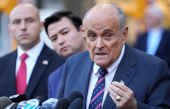 Rudy Giuliani has turned over his 1980 Mercedes-Benz convertible, luxury watch collection and a diamond ring to election workers he defamed