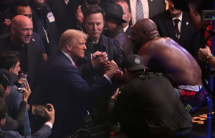 Jon Jones retains UFC heavyweight title with spinning kick to stop Stipe Miocic, celebrates with President-elect Donald Trump