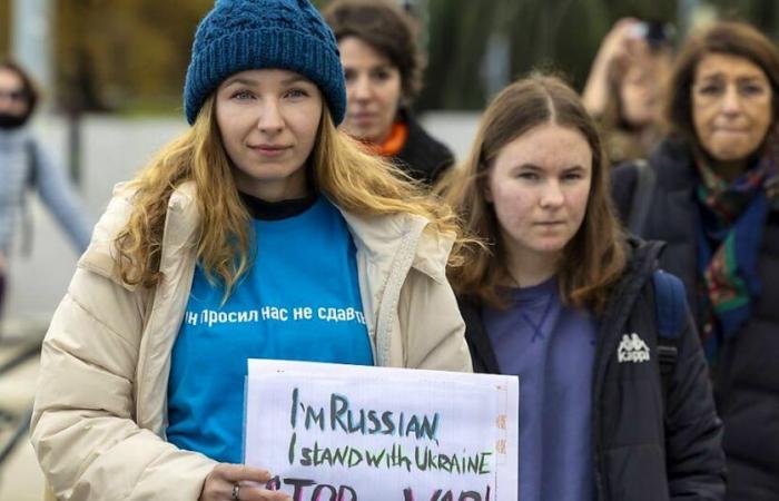 Russia: Russian opposition members protest against Putin regime in Geneva