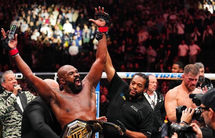 Jon Jones retains UFC heavyweight title with spinning kick to stop Stipe Miocic, celebrates with President-elect Donald Trump