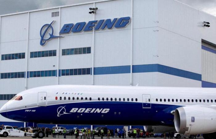 The aircraft manufacturer Boeing begins its workforce reduction plan, with 2,200 layoffs on its historic sites