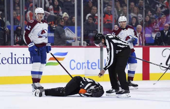 National Hockey League | Referee Mitch Dunning evacuated after violent collision