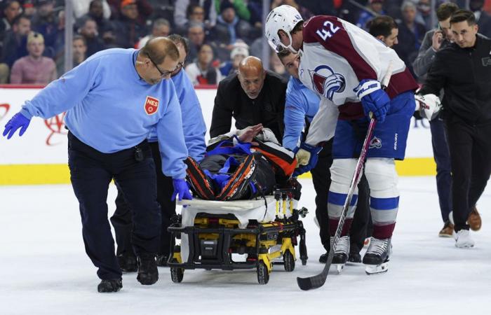 National Hockey League | Referee Mitch Dunning evacuated after violent collision