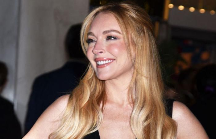 Lindsay Lohan (38 years old) stuns in a neckline down to her navel, she reveals her panties in a transparent dress