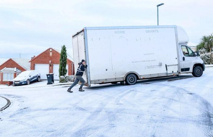 Schools close & Brits battle sheets of snow as temps plunge to -8C with further 8 inches to fall causing travel carnage