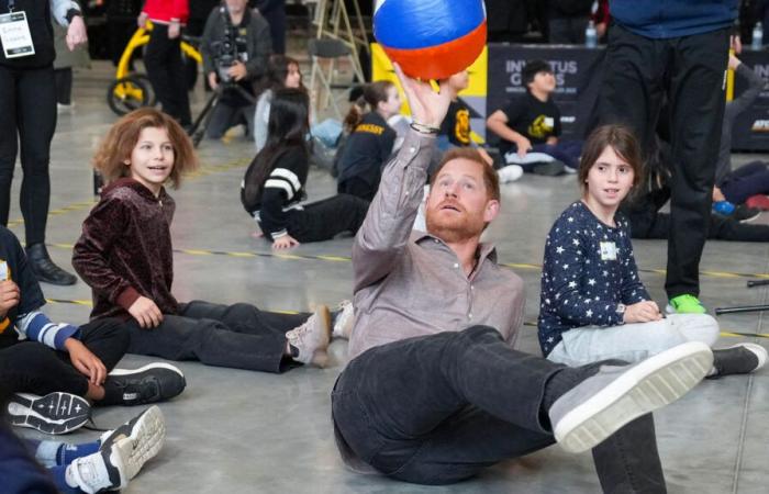 Prince Harry plays sitting volleyball in Canada with elementary school students