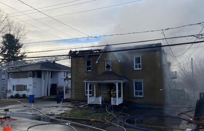 An apartment building in Nicolet is engulfed in flames