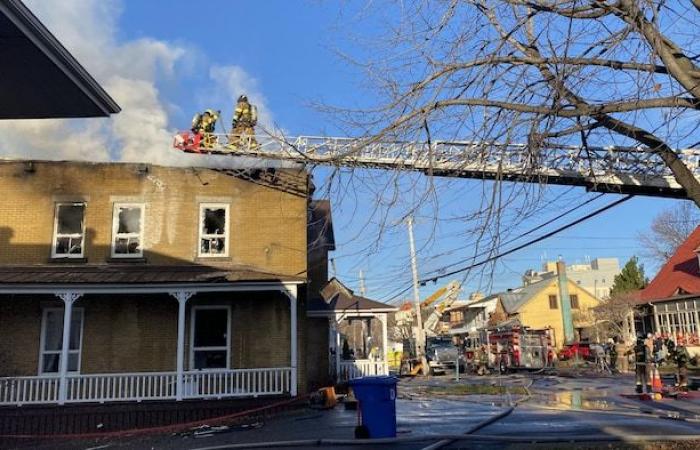 An apartment building in Nicolet is engulfed in flames