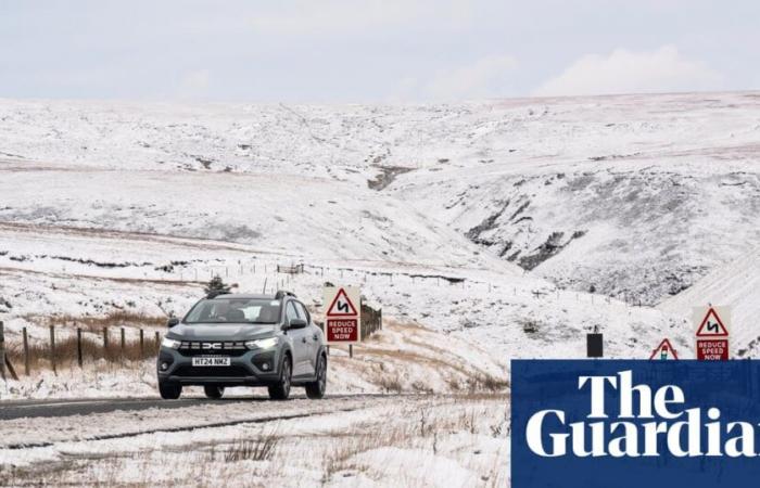 UK weather: snow and ice warning as commuters face widespread disruption | UK weather