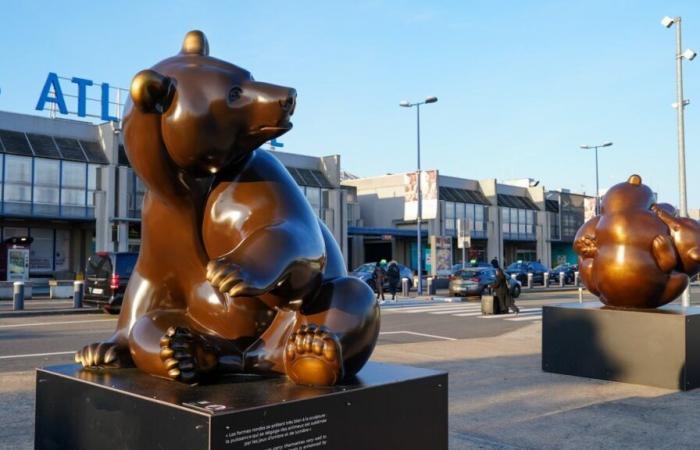 three giant bears by Michel Bassompierre settle in front of the terminal