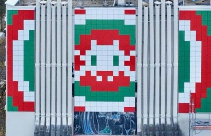 Paris: French artist Invader exhibits a huge work overlooking Place d'Italie