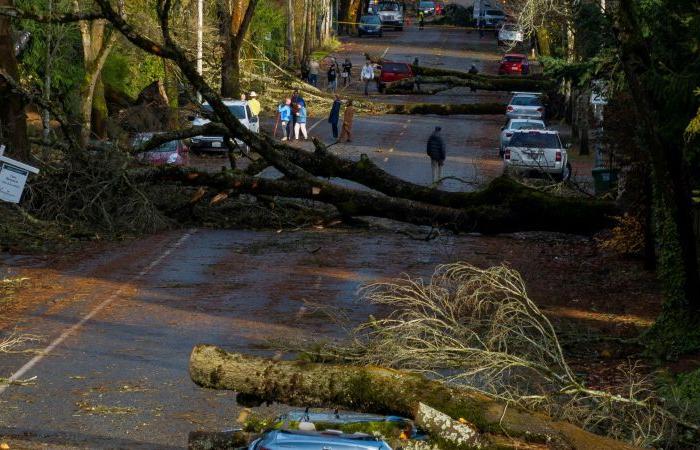 Bomb cyclone kills 2, knocks out power in Washington and Seattle as a new threat arrives for the West Coast