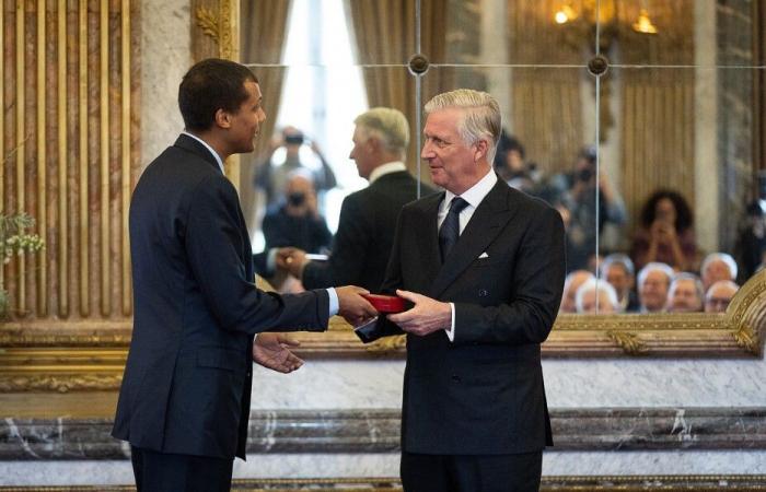 King Philippe of Belgium decorates singer Stromae