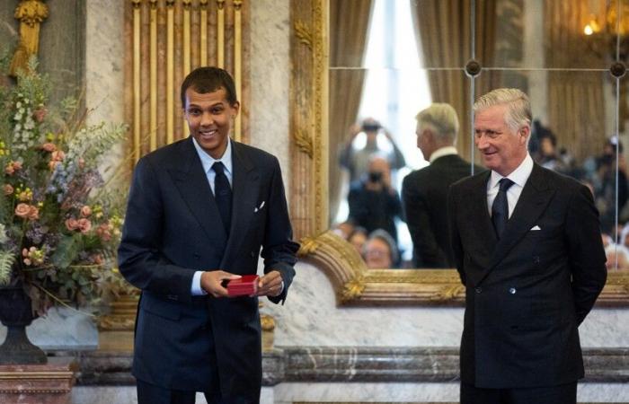 King Philippe of Belgium decorates singer Stromae