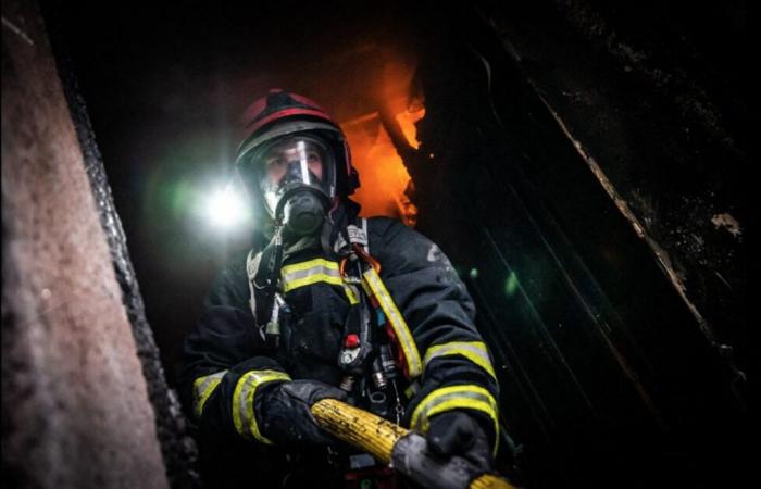 a house ravaged by flames