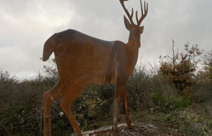 a monumental deer sculpture installed above Chooz