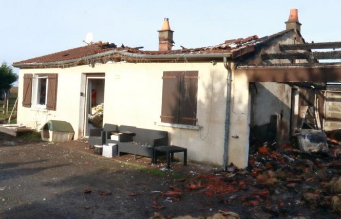 a house destroyed in a fire, the occupants saved by the barking of their dog