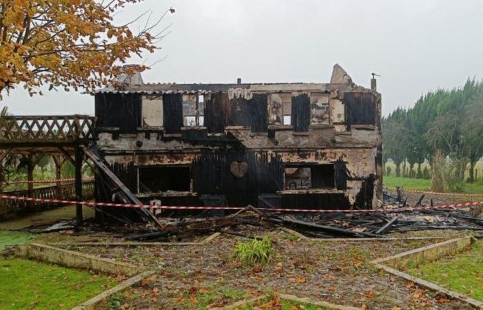 a house completely destroyed, a shocked woman evacuated