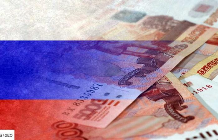 Entangled in new sanctions, Russia sees its precious ruble plummet