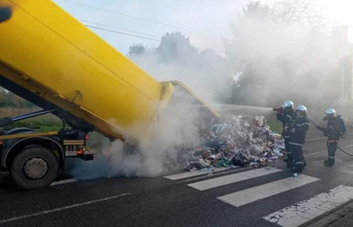 A garbage truck on the verge of catching fire in the Oise