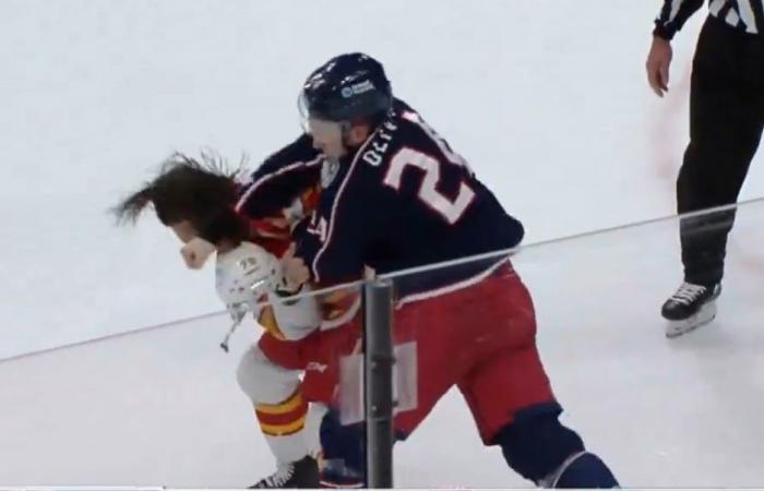 Mathieu Olivier throws down the gloves twice in the second period against the Flames