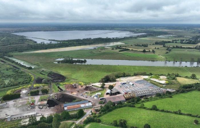 How is EDF committed to preserving the Baupte peat bog in the Cotentin Marshes Park?