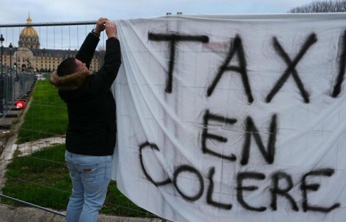 nearly 500 taxis demonstrate around the National Assembly in Paris