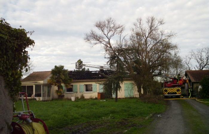 three burning vehicles spread to a house