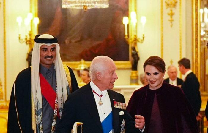 King Charles III carries the Founder's Sword of Qatar and Emir Tamim wears the Order of the Bath at the State Banquet at Buckingham