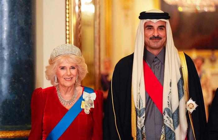 King Charles III carries the Founder's Sword of Qatar and Emir Tamim wears the Order of the Bath at the State Banquet at Buckingham