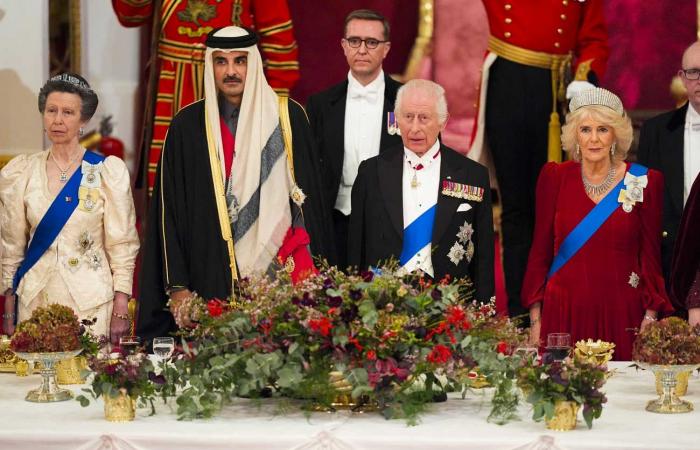 King Charles III carries the Founder's Sword of Qatar and Emir Tamim wears the Order of the Bath at the State Banquet at Buckingham