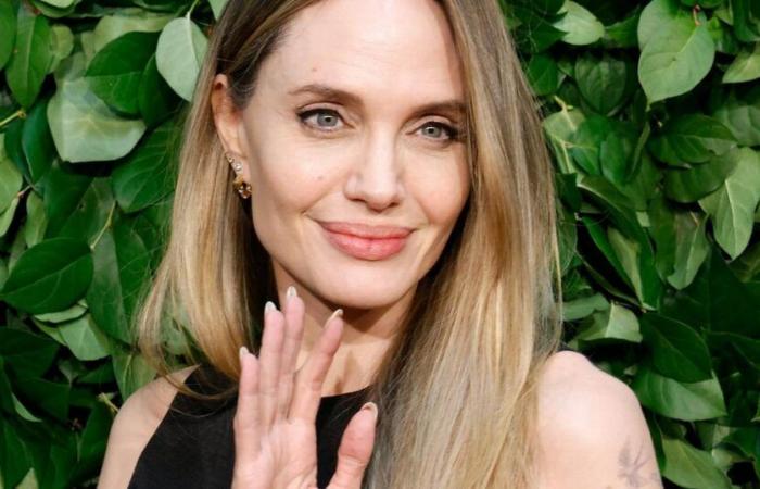 What strong symbol is hidden behind Angelina Jolie's new tattoo?