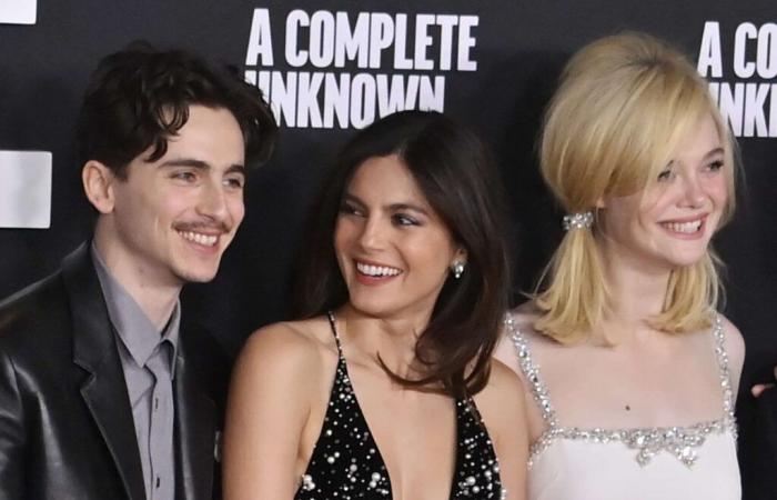 Timothée Chalamet shows off his mustache alongside Elle Fanning, a real vintage doll