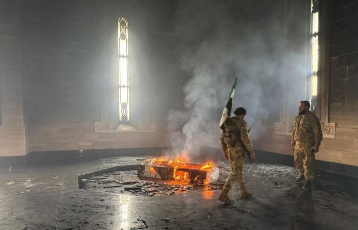 In Syria, the tomb of former President Hafez al-Assad was set on fire by rebel fighters