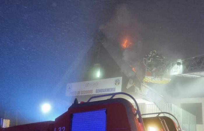 Field of Fire. The roof of the Civil Protection chalet on fire