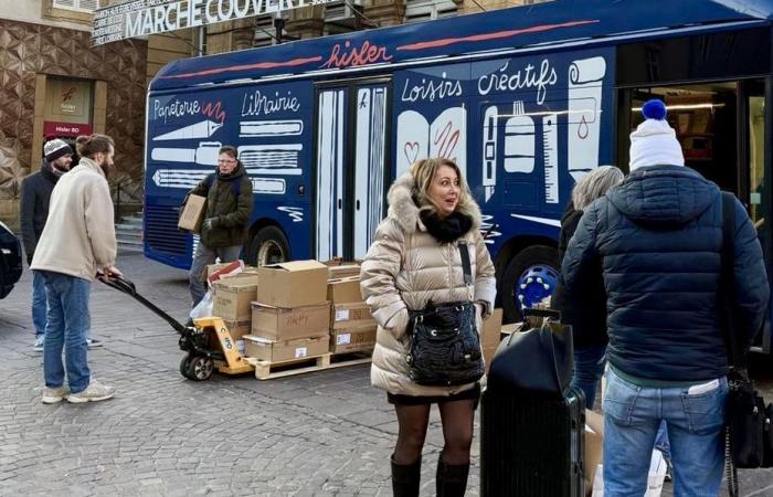 After the fire and just before Christmas, the Hisler bookstore moves into a bus and reunites with its customers