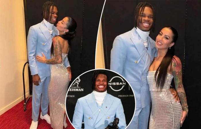 Travis Hunter, fiancée Leanna Lenee get cozy during Heisman Trophy win