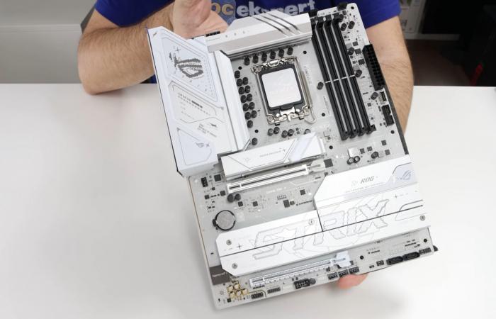 A white motherboard with 10 USB ports at a low price