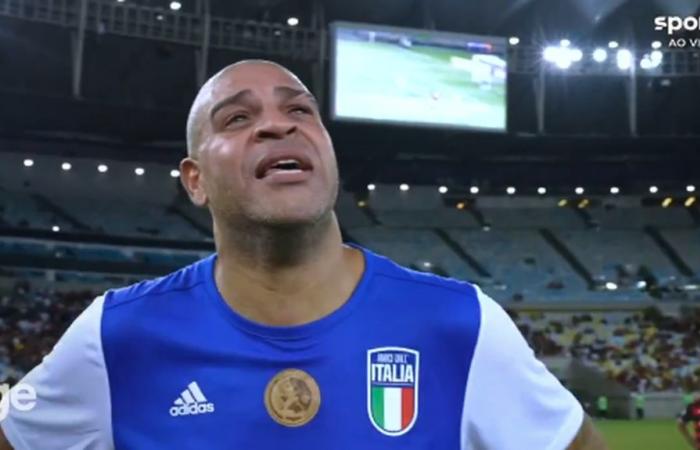 Adriano cries when he hears his dead father’s voice