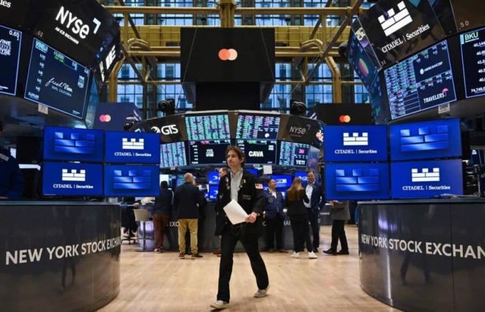 Wall Street ends sharply lower after Fed announcements