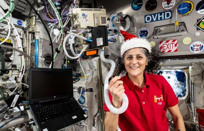 why will two NASA astronauts spend Christmas in space against their will?